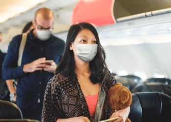 Rajkotupdates.news : covid explosion on flight from italy