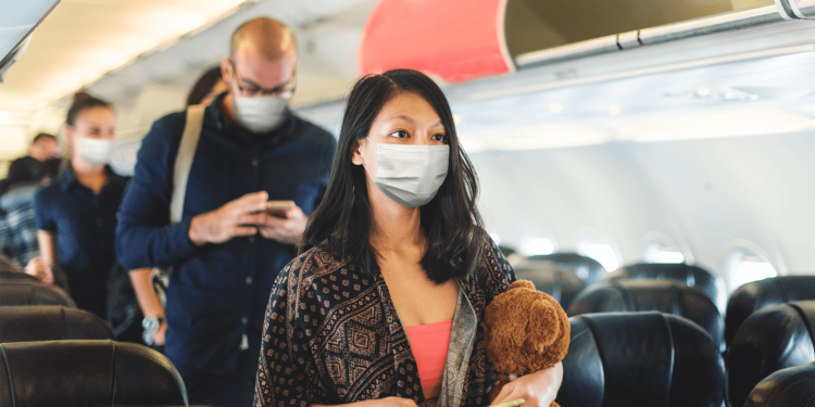 Rajkotupdates.news : covid explosion on flight from italy